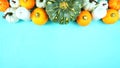 Happy Thanksgiving setting modern elegant blue orange and white table flat lay. Royalty Free Stock Photo