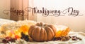Happy thanksgiving text. In home decorated Pumpkin, cones, walnuts and autumn leaves garland. autumn fall holidays. Cozy mood Royalty Free Stock Photo