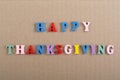 HAPPY THANKSGIVING word on wooden background composed from colorful abc alphabet block wooden letters, copy space for ad text. Royalty Free Stock Photo
