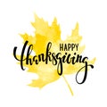 Happy thanksgiving on yellow watercolor maple leaf. Hand drawn calligraphy and brush pen lettering. design for holiday greeting ca Royalty Free Stock Photo