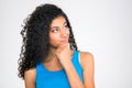 Happy thoughtful afro american woman looking up Royalty Free Stock Photo