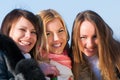Happy three beautiful young women Royalty Free Stock Photo