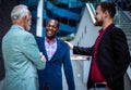 Happy Three business men talking Royalty Free Stock Photo