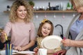 Happy three generation of woman during preparation of Easter decorations Royalty Free Stock Photo