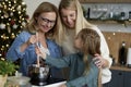 Happy three generations in the kitchen during Christmas baking Royalty Free Stock Photo