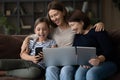 Happy three generations of women using modern devices together Royalty Free Stock Photo