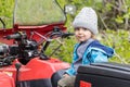 Portrait of young boy on quad bike Royalty Free Stock Photo