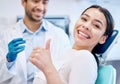 Happy, thumbs up and portrait of dentist and patient for teeth whitening, service and dental care. Healthcare, dentistry
