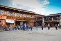 Happy Tibetan dancing in Shangri-La square