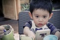 Happy time  baby Asian boy with smartphone Royalty Free Stock Photo