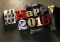 Happy 2016 title in vintage wood block text and hashtag Royalty Free Stock Photo