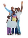 Happy to be together. Studio shot of two african men with their kids holding a blank board, isolated on white. Royalty Free Stock Photo