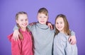 Happy to have such good friends. Teens friends. Girl and boy true friendship. Children smiling faces on violet