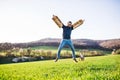 Happy toddler boy playing outside with father in spring nature. Royalty Free Stock Photo