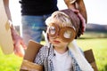 Happy toddler boy playing outside with father in spring nature. Royalty Free Stock Photo