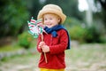 Happy toddler boy holding Italian flag outdoors Royalty Free Stock Photo