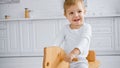 happy toddler boy laughing and riding Royalty Free Stock Photo