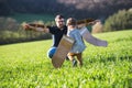 Happy toddler boy playing outside with father in spring nature. Royalty Free Stock Photo