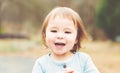 Happy toddler girl playing outside Royalty Free Stock Photo