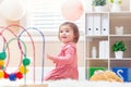 Happy toddler girl playing with toys Royalty Free Stock Photo