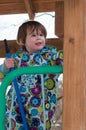 Happy toddler girl in warm coat on on snow day and having a fun in the winter outside, outdoor portrait Royalty Free Stock Photo