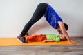 Happy toddler having fun while mother exercising