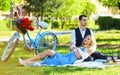 Happy together. My darling. Idyllic moment. Man and woman in love. Picnic time. Spring date. Playful couple having Royalty Free Stock Photo