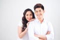 Happy together. Young in love couple smiling and standing against background Royalty Free Stock Photo