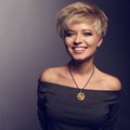 Happy toothy laughing woman with short blond bob hairstyle in gr Royalty Free Stock Photo