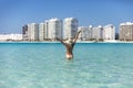 Happy tourist on blue seagull beach in Cancun city in Riviera Maya of Mexico. Turquoise caribbean beach.