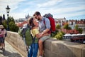 Happy tourist couple sightseeing; Traveller lifestyle