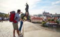 Happy tourist couple taking a selfie; Traveller lifestyle