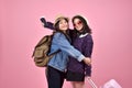 Happy tourist girlfriends meeting and hugging at the airport, Young asian traveler having fun together.