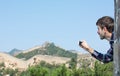 Happy tourist on the Great Wall of China Royalty Free Stock Photo