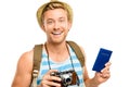 Happy tourist holding passport retro camera isolated on white