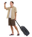 Happy tourist with wheels bag making photo Royalty Free Stock Photo