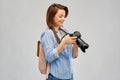 Happy tourist woman with backpack and camera Royalty Free Stock Photo