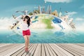 Happy tourist and the world monument background Royalty Free Stock Photo