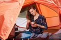 Happy tourist girl have lunch in tent Royalty Free Stock Photo