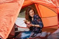 Happy tourist girl have lunch in tent Royalty Free Stock Photo