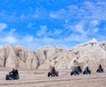 Happy tourists enjoying a quad bike ride in Cappadocia, Turkey Royalty Free Stock Photo