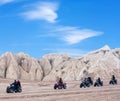 Happy tourists enjoying a quad bike ride in Cappadocia, Turkey Royalty Free Stock Photo