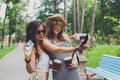 Happy tourists girl friends taking selfie photos Royalty Free Stock Photo