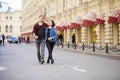 Happy tourists sightseeing city with map Royalty Free Stock Photo