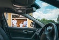 Happy traditional family near their house portrait who bought new car. Inside car view Royalty Free Stock Photo