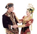 Happy traditional java wedding couple