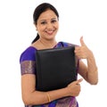 Happy traditional woman holding folder Royalty Free Stock Photo