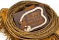 Happy trails sign circled with rawhide lasso rope Royalty Free Stock Photo