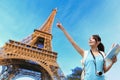 Happy travel woman in Paris
