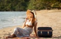 Happy traveler woman on tropical beach vacation Royalty Free Stock Photo